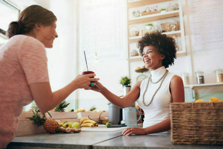 a woman and a man in a kitchen